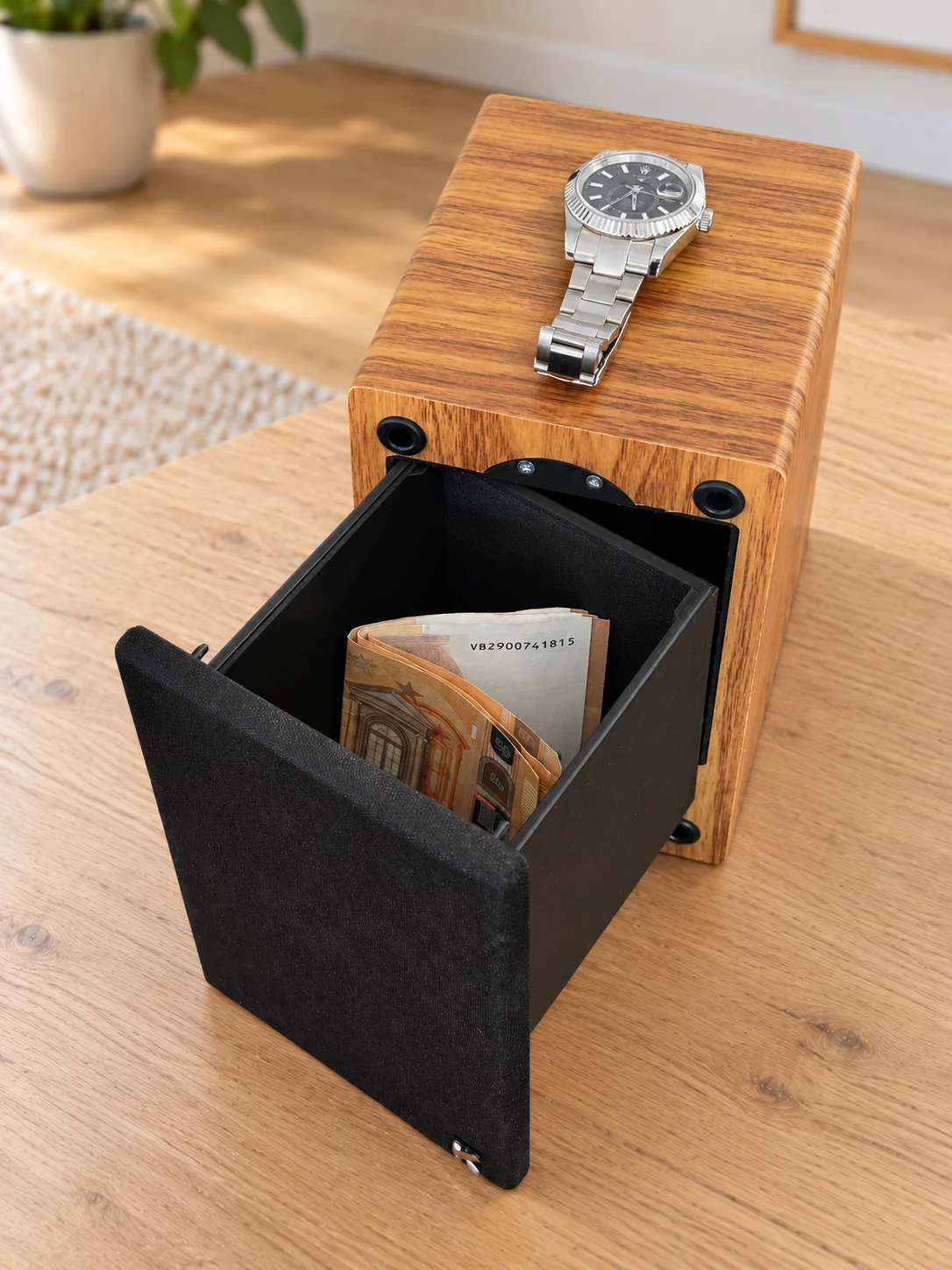NIKO open, with banknotes in the drawer and a watch on top